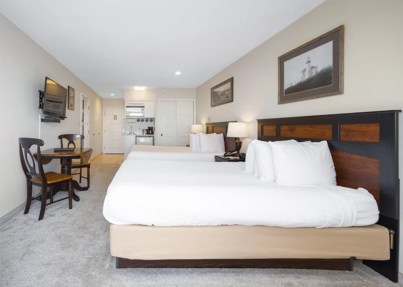 Inn at Spanish Head oceanfront bedroom two beds